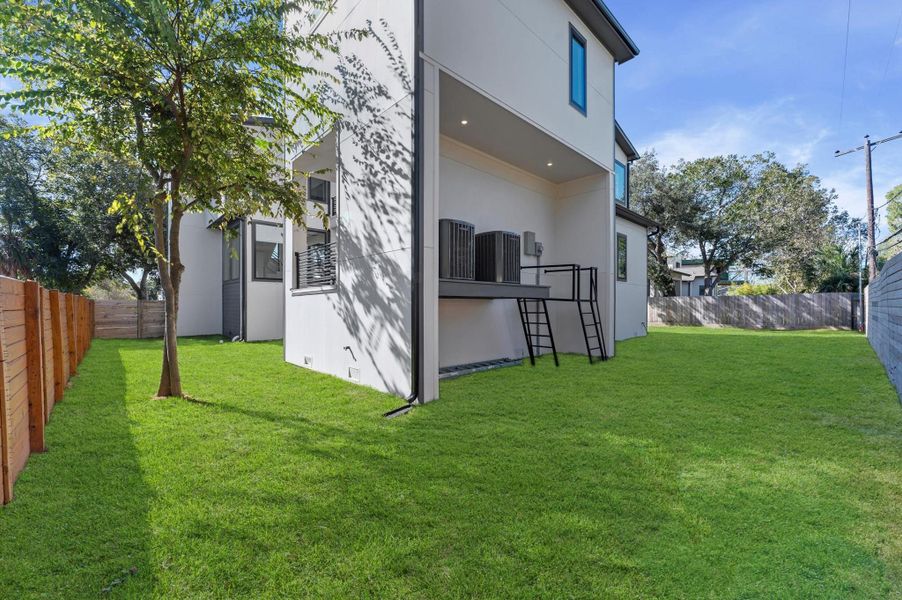 Exterior details and patio area of a home in , Houston (Image 2).