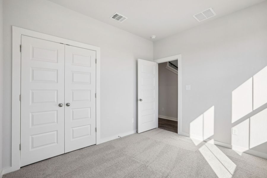 A room with white doors.