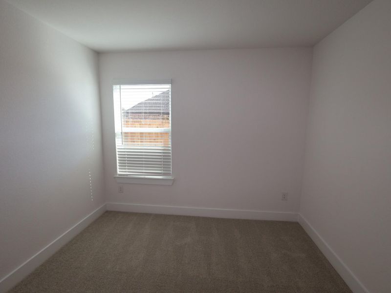 Spacious, unfurnished interior of a new home in Hallimore Ranch, Rosenberg (Image 27).