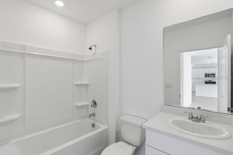 Furnished interior view inside a new home in Waterstone, Groveland (Image 20).