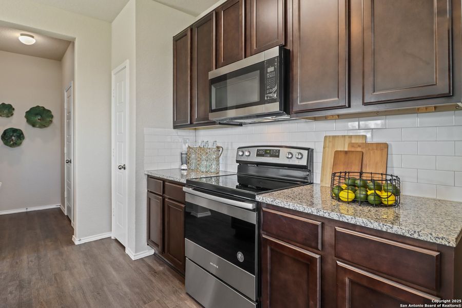 Furnished interior view inside a new home in Blue Ridge Ranch, San Antonio (Image 32).