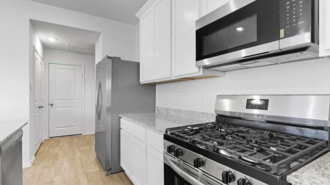 Furnished interior view inside a new home in Tamarron, Fulshear (Image 7).