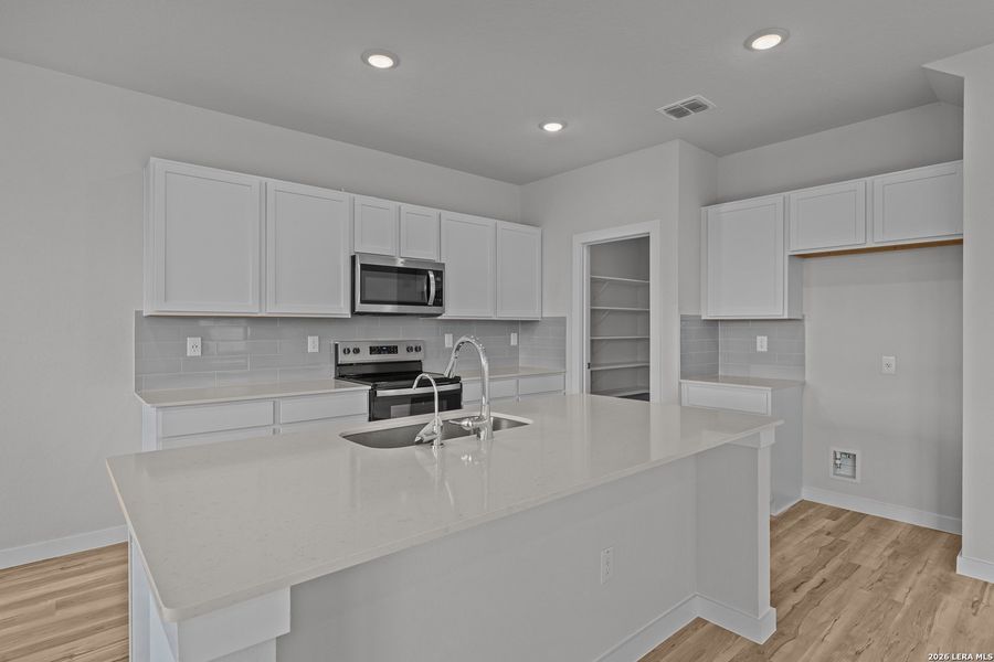 Furnished interior view inside a new home in Spring Creek, San Antonio (Image 6).