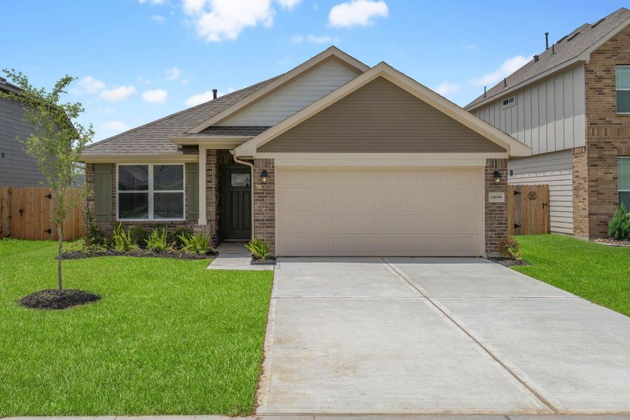 Front exterior of a new home in Grand Oaks Reserve, Cleveland, TX, highlighting curb appeal (Image 1). Front exterior of a new home in Grand Oaks Reserve, Cleveland, TX, highlighting curb appeal (Image 1).