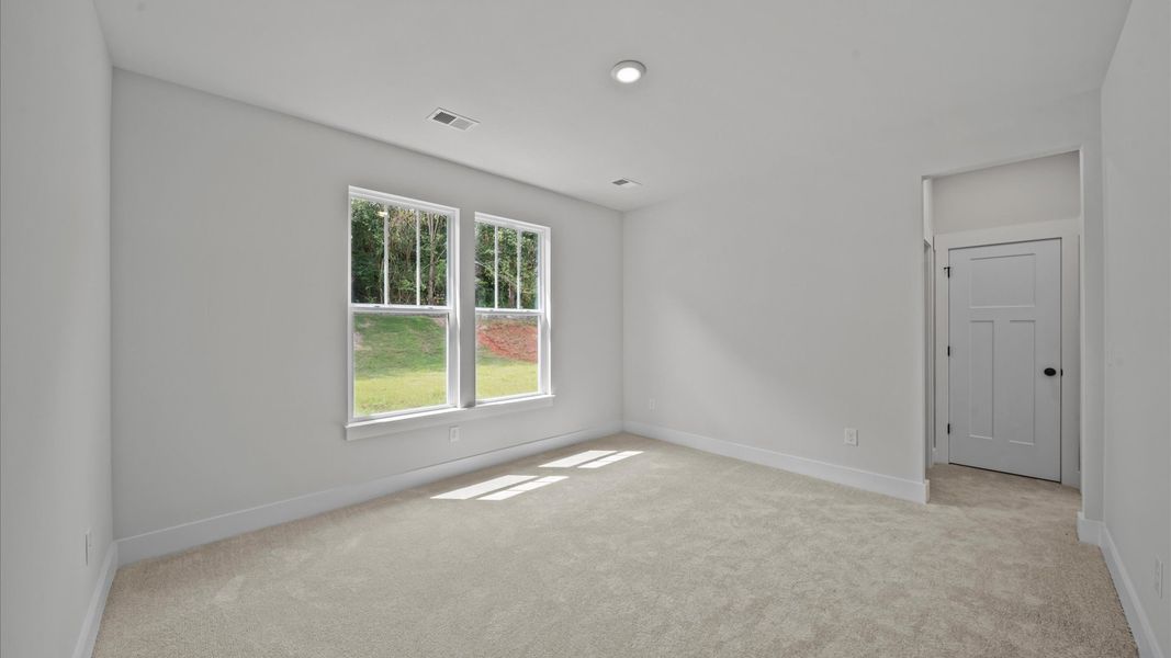 Memorable mornings begin in this tasteful and thoughtfully crafted primary suite