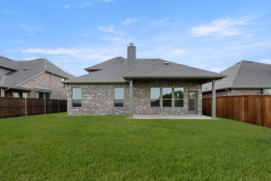 Exterior details and patio area of a home in Silo Mills, Joshua (Image 4).