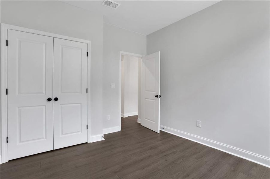 Spacious, unfurnished interior of a new home in The Paddocks at Doc Hughes, Buford (Image 28). Spacious, unfurnished interior of a new home in The Paddocks at Doc Hughes, Buford (Image 28).