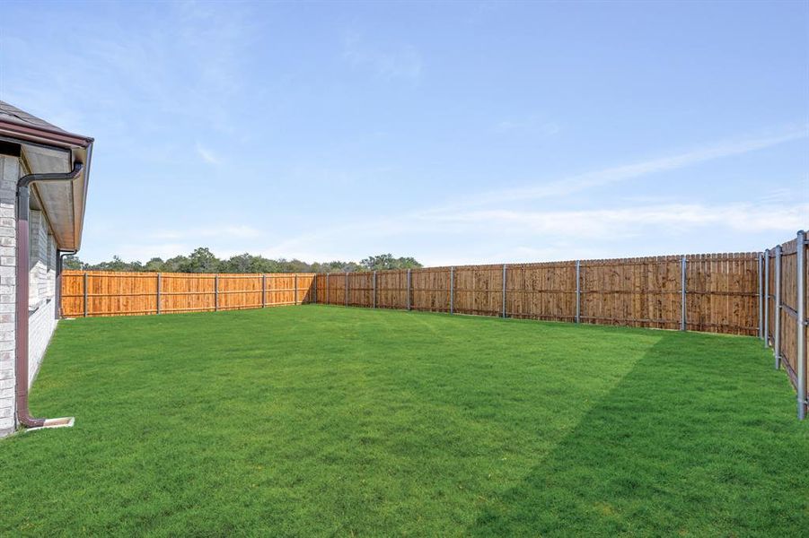 Exterior details and patio area of a home in East Oak Creek 60-65, Commerce (Image 24).