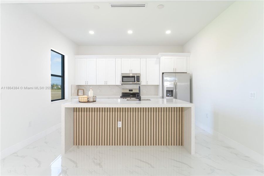 Furnished interior view inside a new home in , Cape Coral (Image 3).
