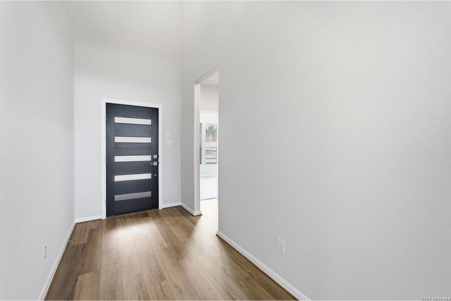 Spacious, unfurnished interior of a new home in The Woodlands at Medina Hills, Mico (Image 30).