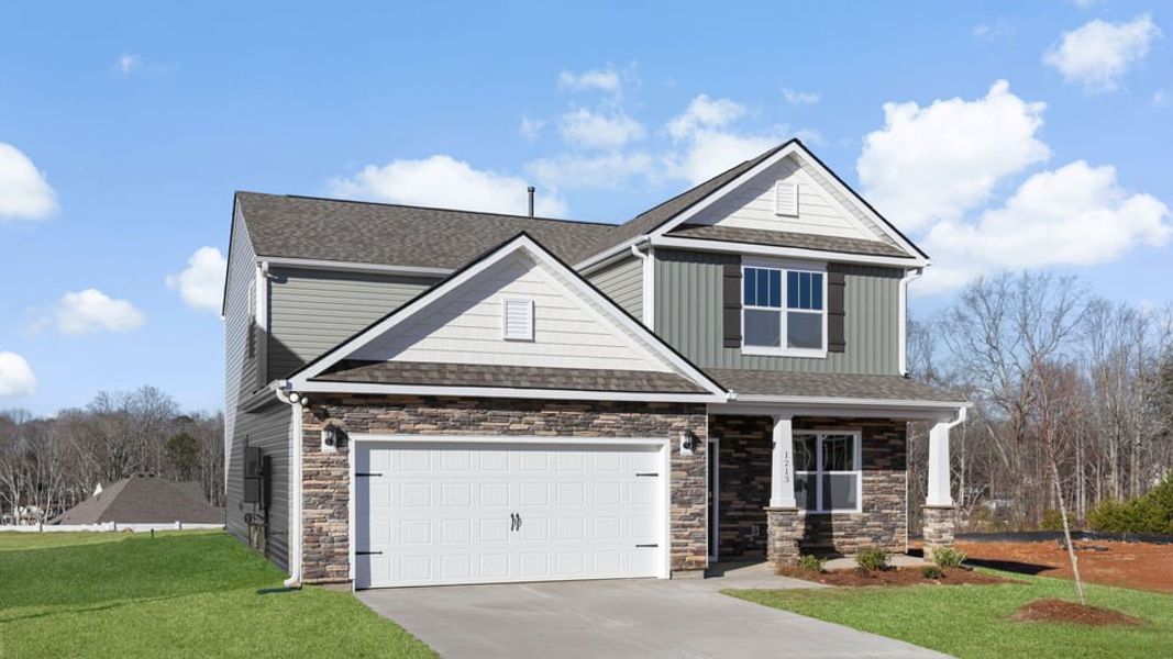 Front exterior of a new home in Woodhaven, Spartanburg, SC, highlighting curb appeal (Image 2). Front exterior of a new home in Woodhaven, Spartanburg, SC, highlighting curb appeal (Image 2).