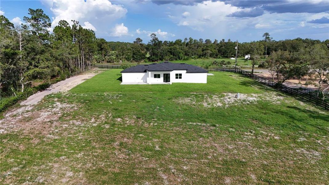 Front exterior of a new home in , Eustis, FL, highlighting curb appeal (Image 23).