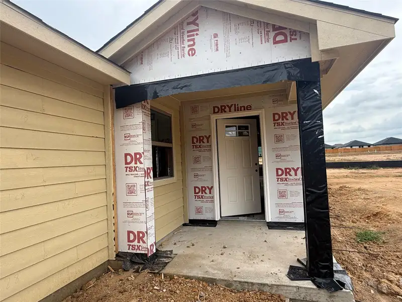 In-progress construction of a new home in Lexington Heights, Willis, TX (Image 10).
