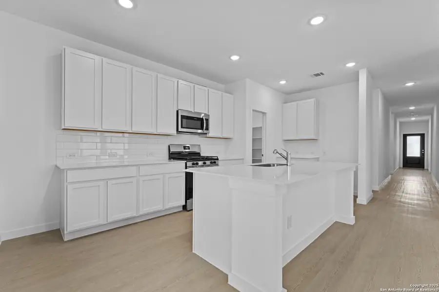 Furnished interior view inside a new home in Hidden Trails: Coastline Collection, Bulverde (Image 3).