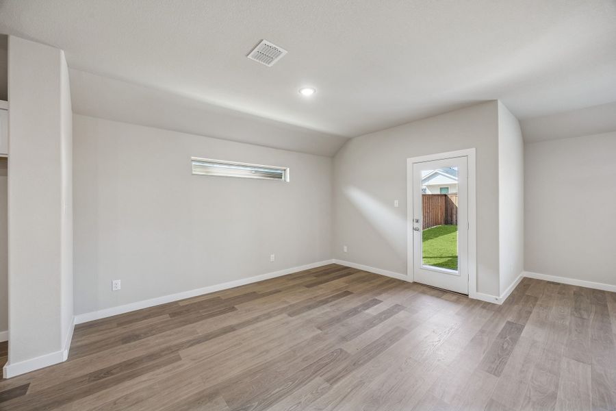 Dining room in the Heisman home plan by Trophy Signature Homes – REPRESENTATIVE PHOTO