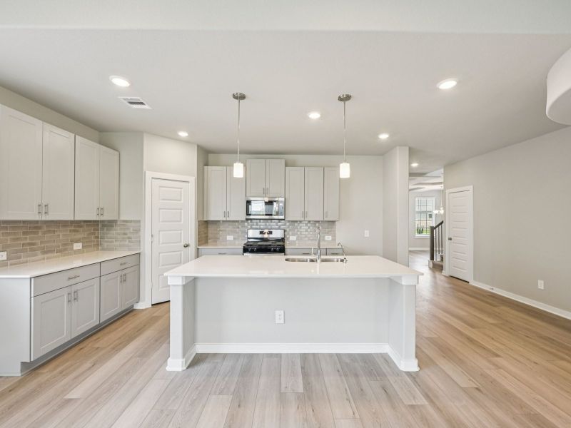 Furnished interior view inside a new home in Heights of Barbers Hill, Baytown (Image 7).