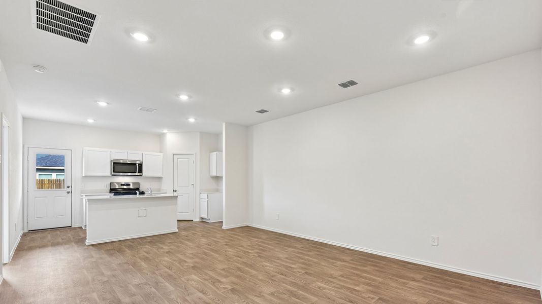 Spacious, unfurnished interior of a new home in Wayside, Uhland (Image 13).