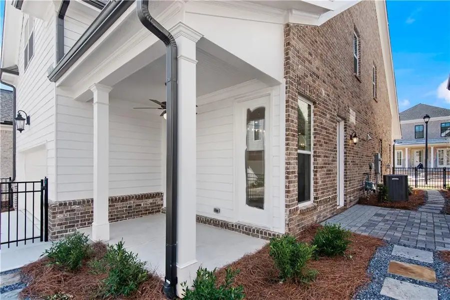 Exterior details and patio area of a home in Waterhaven, Cumming (Image 4).