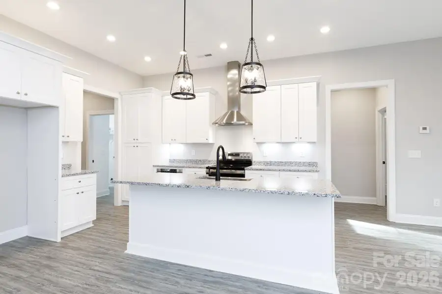 Open floorplan and LVT located throughout the main living area. Open floorplan and LVT located throughout the main living area.