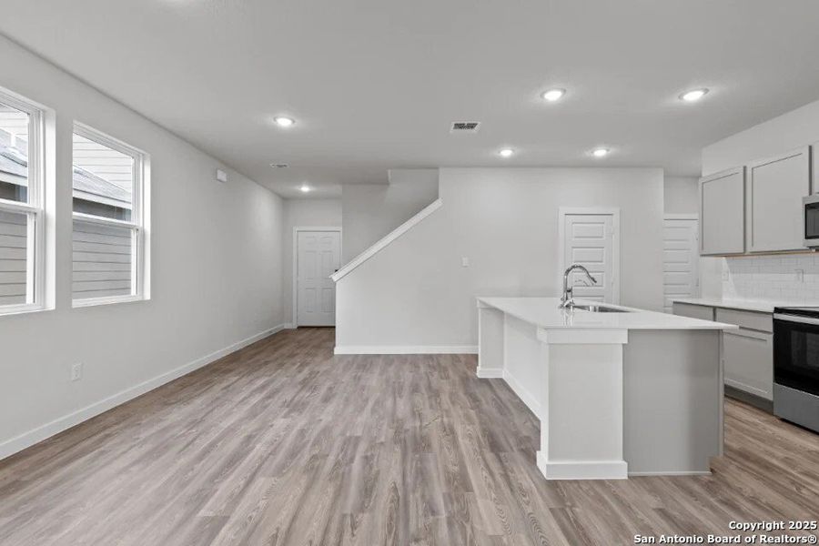 Spacious, unfurnished interior of a new home in Agave, San Antonio (Image 9). Spacious, unfurnished interior of a new home in Agave, San Antonio (Image 9).