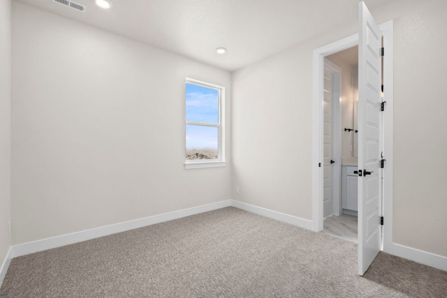 Spacious, unfurnished interior of a new home in Kitchel Lake at Serratoga Falls, Timnath (Image 11).