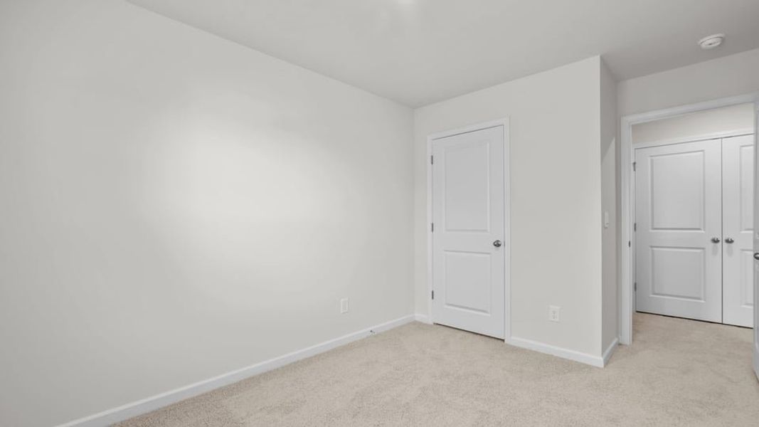 Spacious, unfurnished interior of a new home in The Townes at Ridgewood Farms, Winterville (Image 33).
