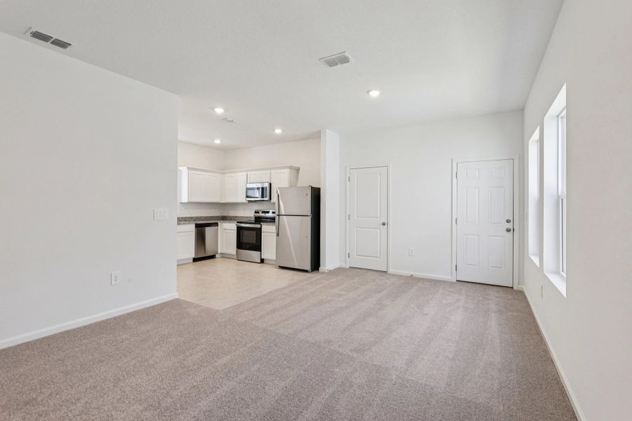 Representative unfurnished interior of a home built from the Ellis by Starlight Homes in Hawks Run, Kissimmee (Image 15).