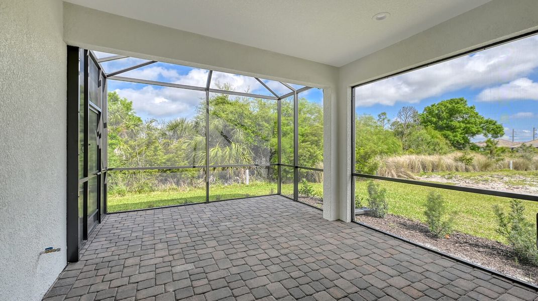 Exterior details and patio area of a home in Boca Royale Golf and Country Club at Wellen Park, Englewood (Image 24).