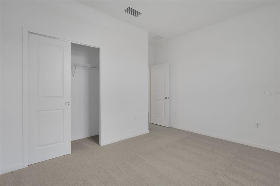 Spacious, unfurnished interior of a new home in Annabelle Estates, Winter Haven (Image 15).