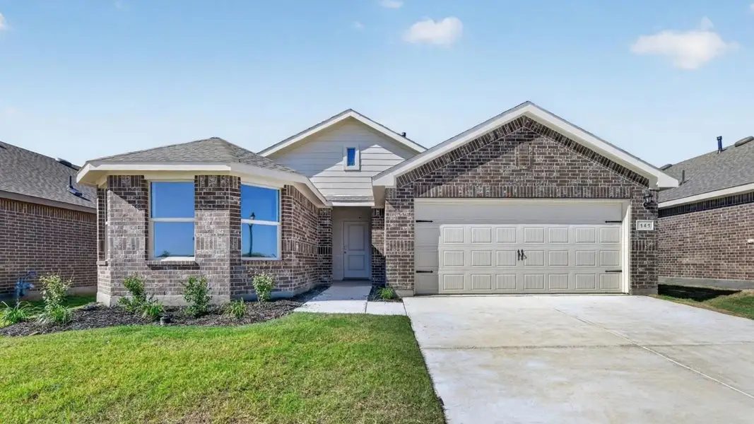Front exterior of a new home in The Hills at Reunion, Newark, TX, highlighting curb appeal (Image 19).