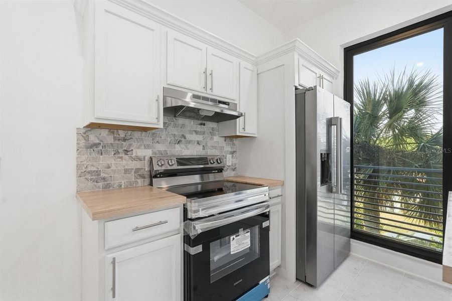 Furnished interior view inside a new home in , Flagler Beach (Image 6).