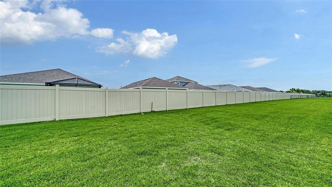 Exterior details and patio area of a home in Canoe Creek, Parrish (Image 22).