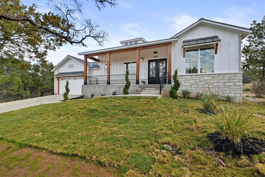 Front exterior of a new home in , Horseshoe Bay, TX, highlighting curb appeal (Image 27).