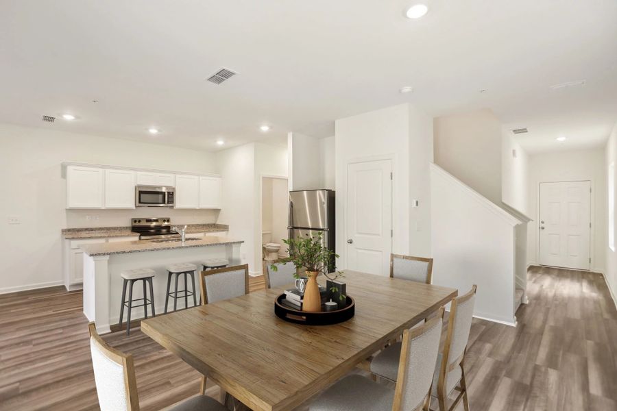 Representative furnished interior of a home built from the Triton by Starlight Homes in Kendall Grove, McDonough (Image 5).