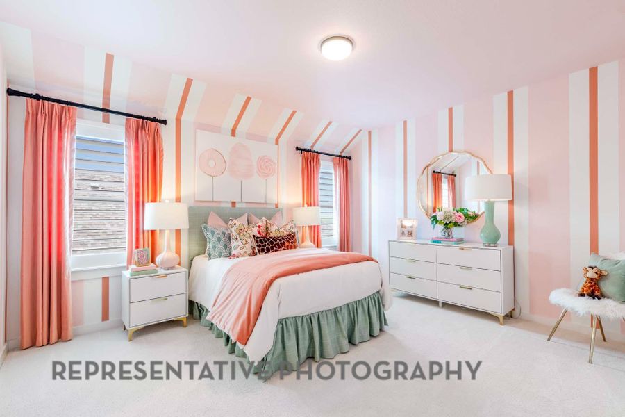 Bedroom with wallpapered walls and light colored carpet Bedroom with wallpapered walls and light colored carpet