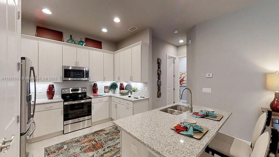 Furnished interior view inside a new home in Westlake Townhomes, Ormond Beach (Image 4).