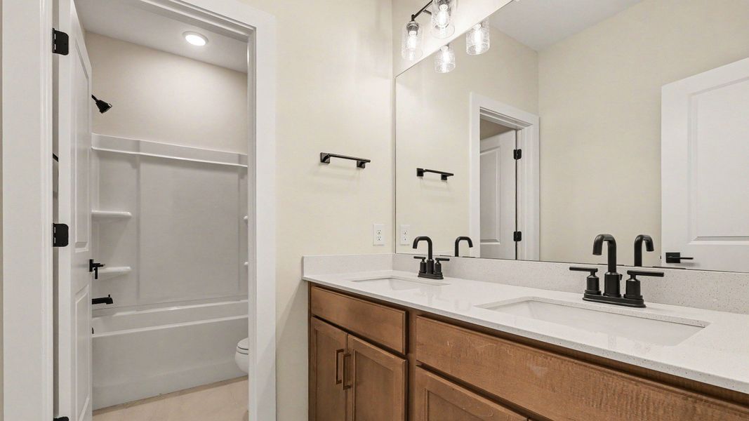 Shared Dual vanity bathroom between bedrooms