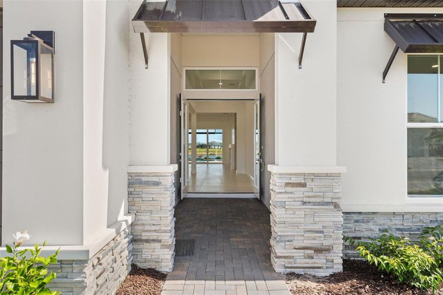 Exterior details and patio area of a home in , Sarasota (Image 3).