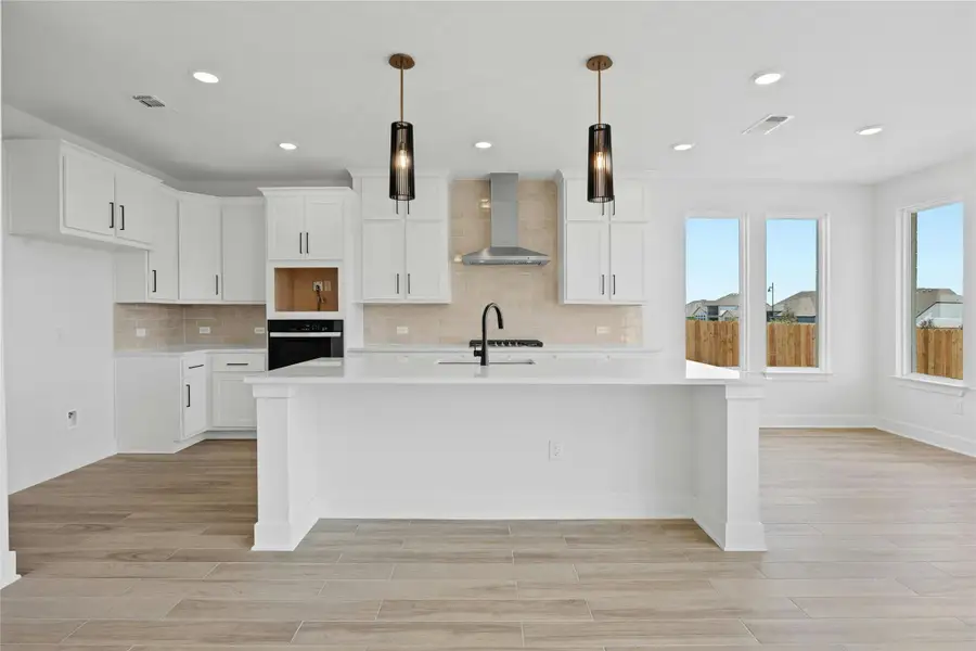 Furnished interior view inside a new home in Flora - 60', Hutto (Image 2).