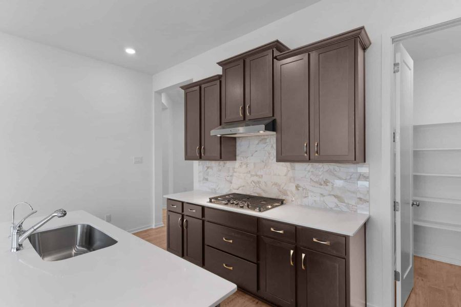 Furnished interior view inside a new home in Carillon, Manor (Image 10).