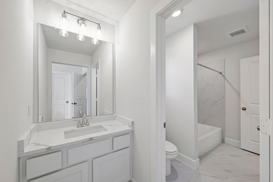 Furnished interior view inside a new home in Lakeside at Tessera, Lago Vista (Image 16).