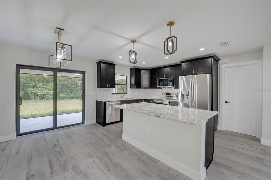 Furnished interior view inside a new home in , Port Charlotte (Image 6).