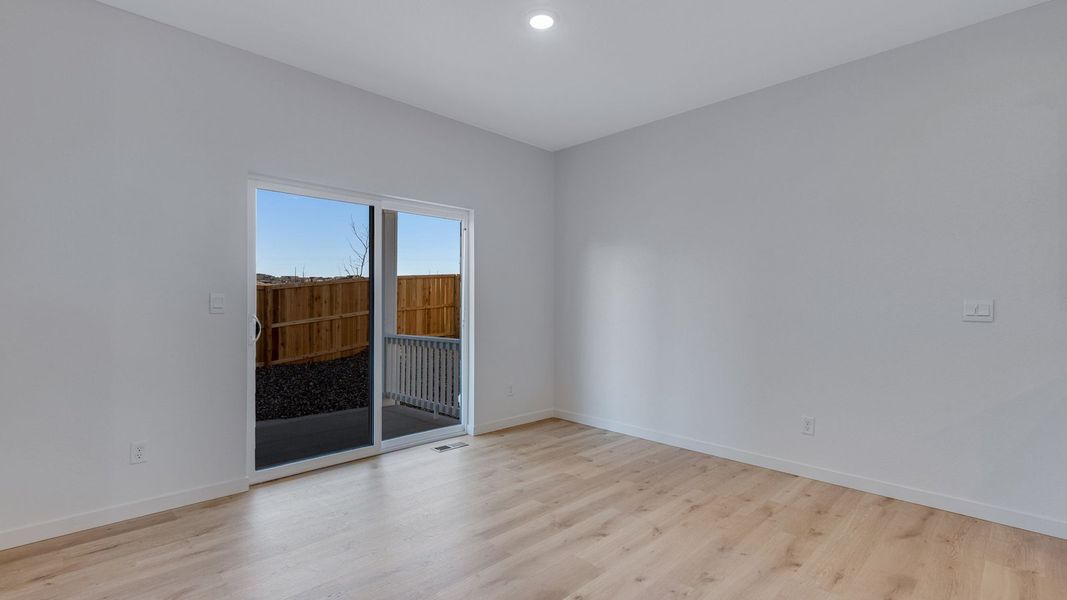 Spacious, unfurnished interior of a new home in Trails at Crowfoot, Parker (Image 11).