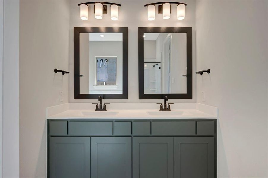 Bathroom featuring double vanity Bathroom featuring double vanity