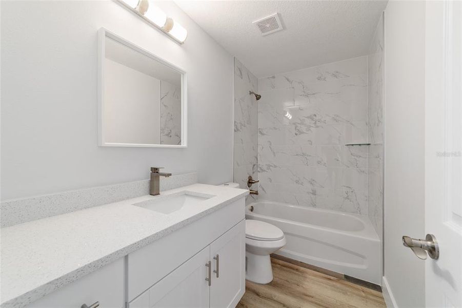 Furnished interior view inside a new home in , Dunnellon (Image 9).