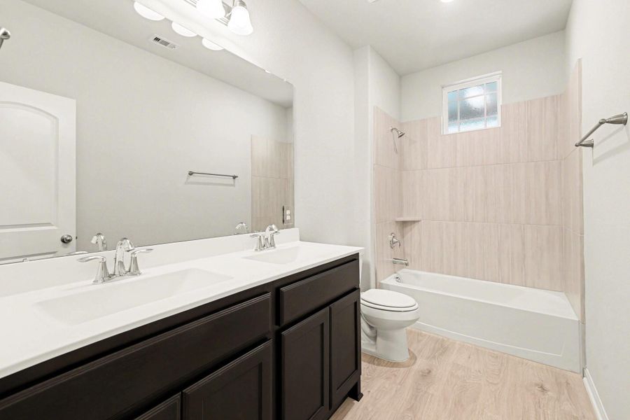 Furnished interior view inside a new home in Clear View Estates, Willis (Image 16).