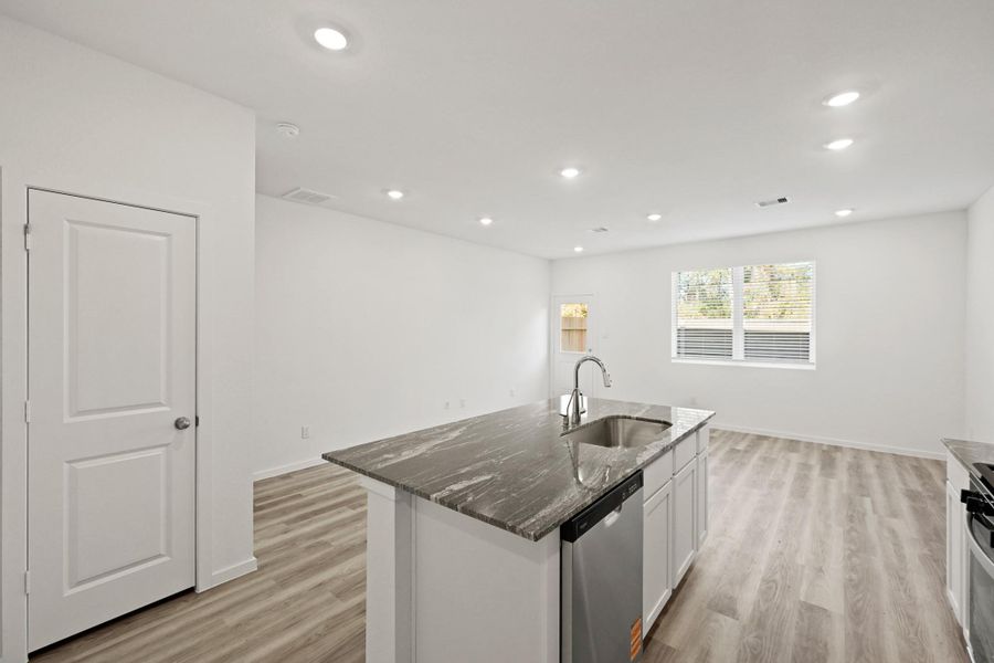 Furnished interior view inside a new home in Bridges on Lake Houston Villas, Humble (Image 9).