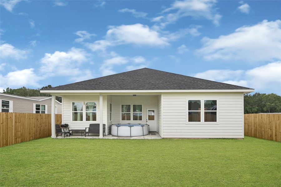 Exterior details and patio area of a home in , Conroe (Image 23).