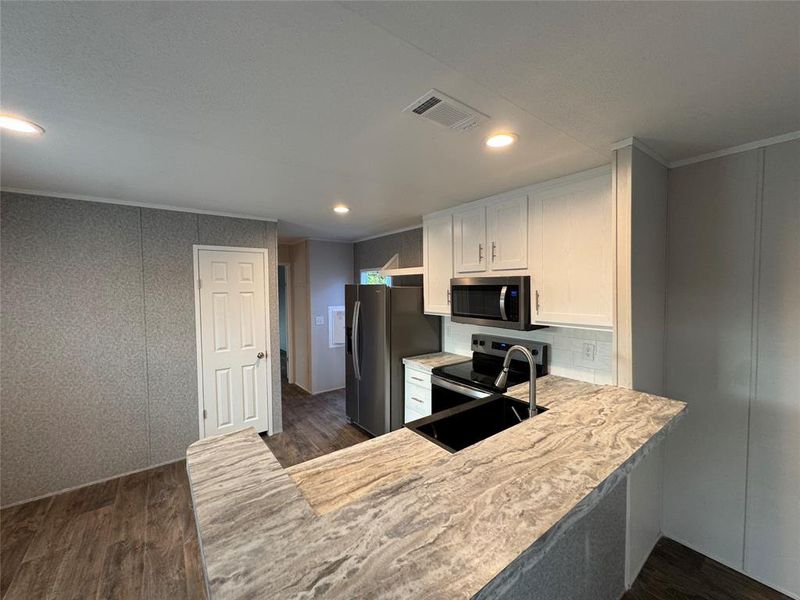 Furnished interior view inside a new home in , Granbury (Image 5). Furnished interior view inside a new home in , Granbury (Image 5).