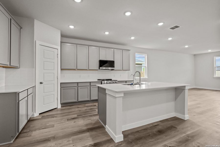 Furnished interior view inside a new home in Cinco Lakes, San Antonio (Image 7).